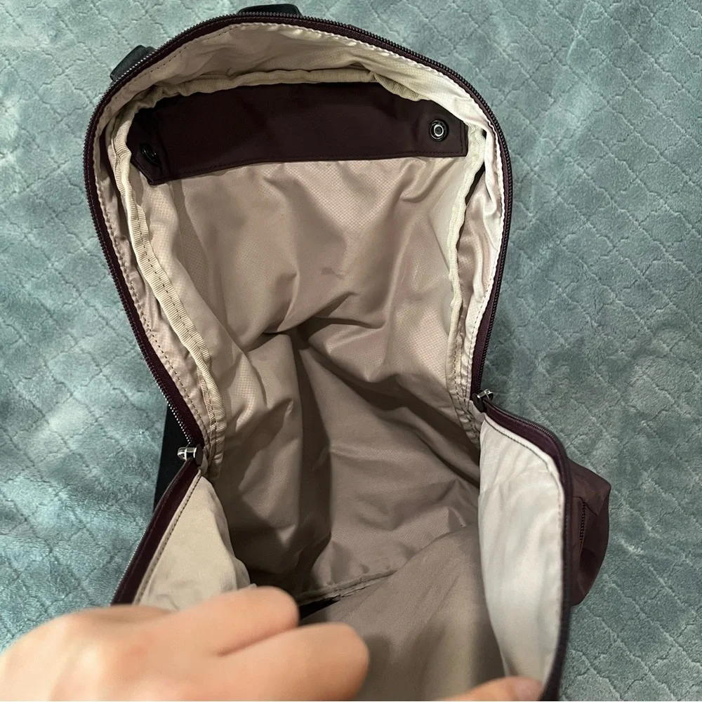 Tumi‎ maroon Backpack with Classic Design and Durable Build